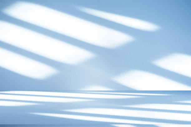 istock Wall interior background, studio, and backdrops show products. with shadow from window color white and blue light. background for text insertion and presentation of product 2158049357