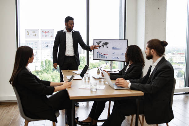 istock Business meeting with team discussing graphs and charts 2158049702