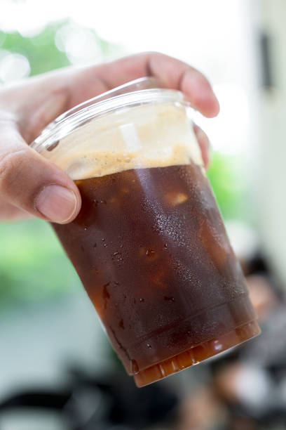 istock Fresh black coffee with ice in a takeaway plastic glass 16oz. 2158049798