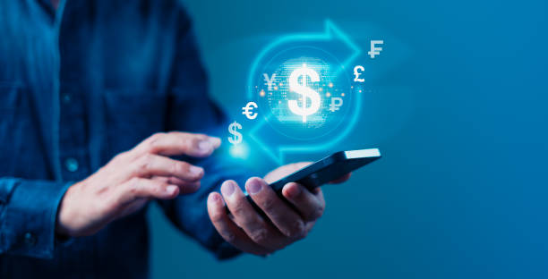 istock A man is holding a cell phone and touching a screen that shows a dollar sign 2158050045