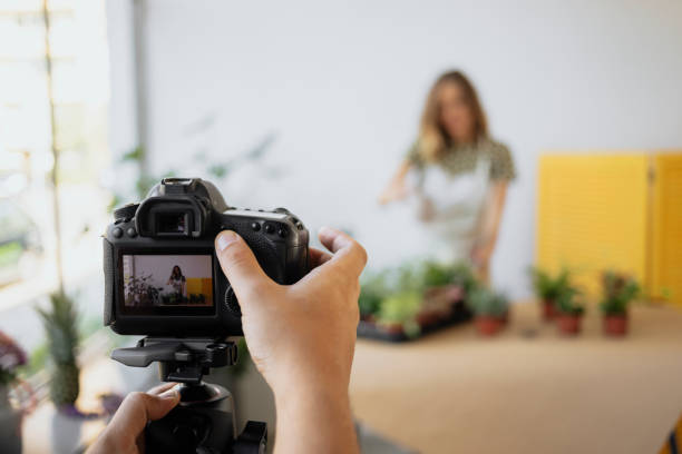 istock Botanical blogger recording a video clip 2158050112