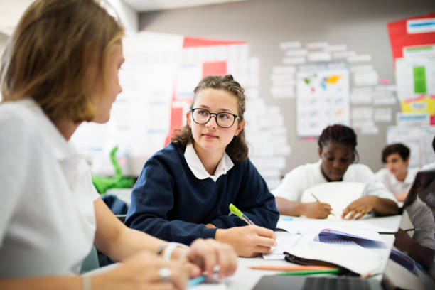 Group of students studying in the classroom