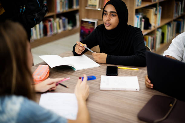 istock A group of students working in the library 2158051042