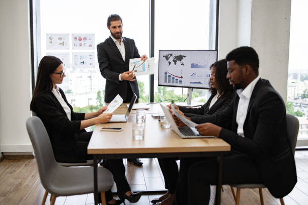 istock Business professionals during team meeting in modern office 2158051306