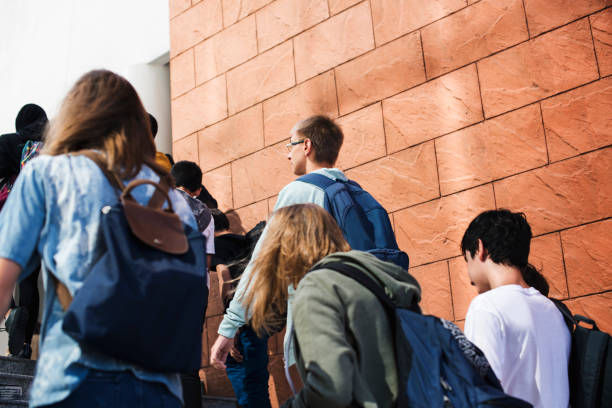 istock Group of students walking in the school 2158051753