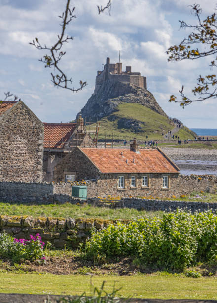View of the nave at Lindisfarne Priory church. The priory was founded by St Aidan in AD635.