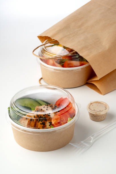 istock Take out poke bowls with craft bag isolated on white background 2158056580
