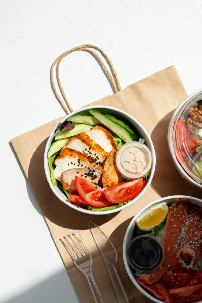 istock Take out poke bowl with craft bag on white background 2158056810