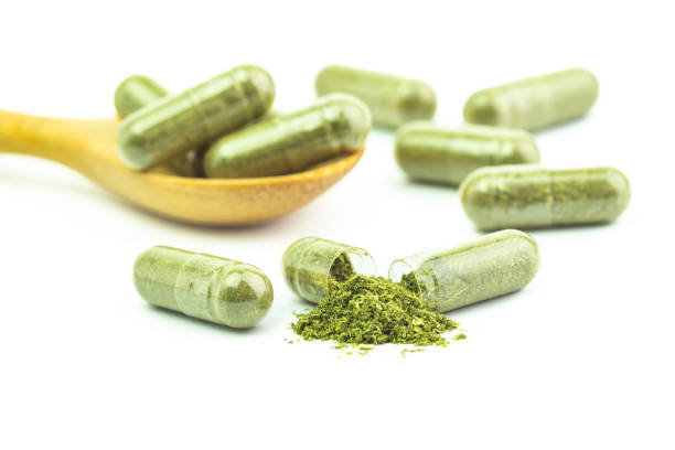 istock Andrographis Paniculata powder herbal capsules isolated 2158057497