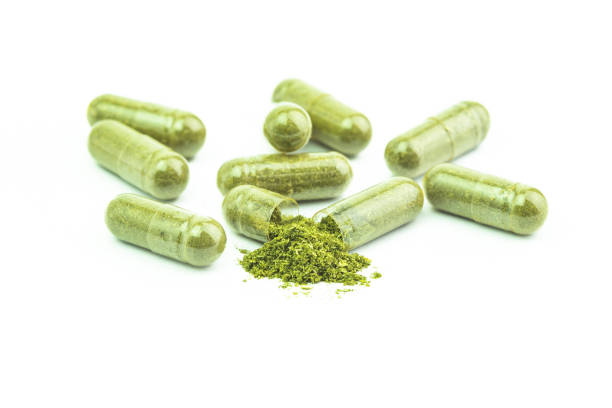 istock Andrographis Paniculata powder herbal capsules isolated 2158057510