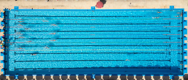 istock Professional swimmers in a Swimming Pool 2158057673