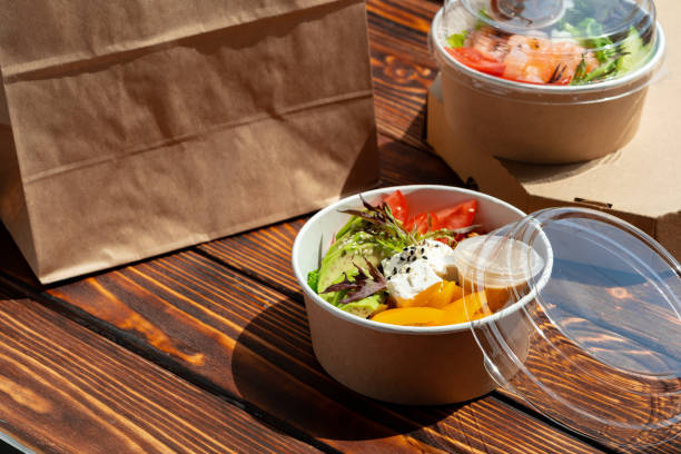 istock Take out poke bowl on wooden background 2158057935