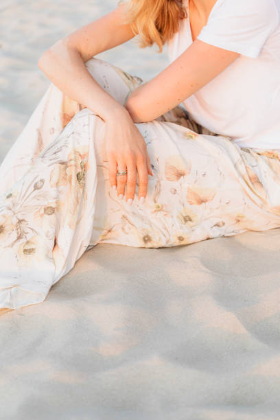 Woman relaxing in the sand at a beach