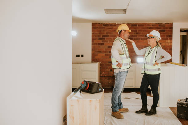 istock Playful wife and husband remodeling home together 2158061841
