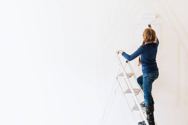 istock Girl home painting for interior renovation 2158062121