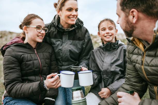istock Camping family having morning drinks 2158062208