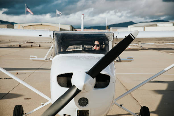 istock Airplane and pilot on the tarmac 2158063227