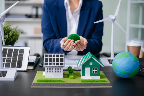 istock Business planning hand using laptop for working technology and business Net zero and carbon neutral concept.NET ZERO 2158063263
