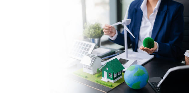 istock Business planning hand using laptop for working technology and business Net zero and carbon neutral concept.NET ZERO 2158063265
