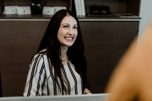 istock Happy woman in the office 2158063411