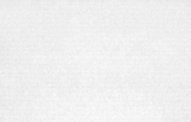 istock White cardboard sheet texture background, detail of recycle paper box pattern. 2158064606