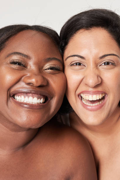 istock Women laughing body positivity studio shoot 2158066517