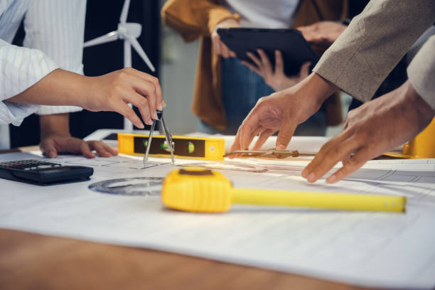 istock Engineer Teamwork Meeting, Drawing working on blueprint meeting for project working with partner on model building at company office. 2158066832