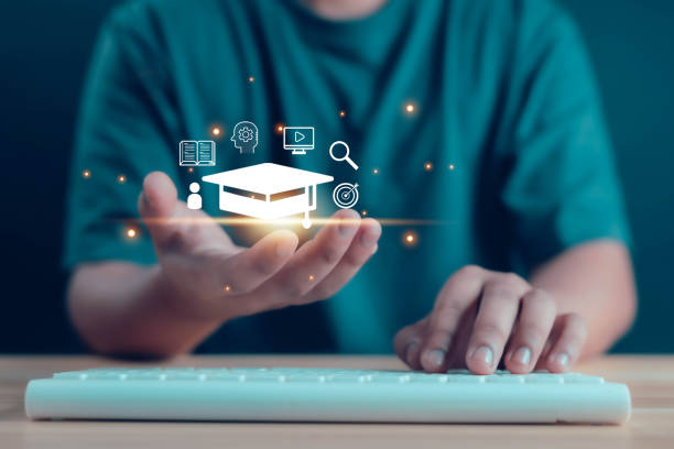 istock male graduate diploma course showing graduation hat 2158069576
