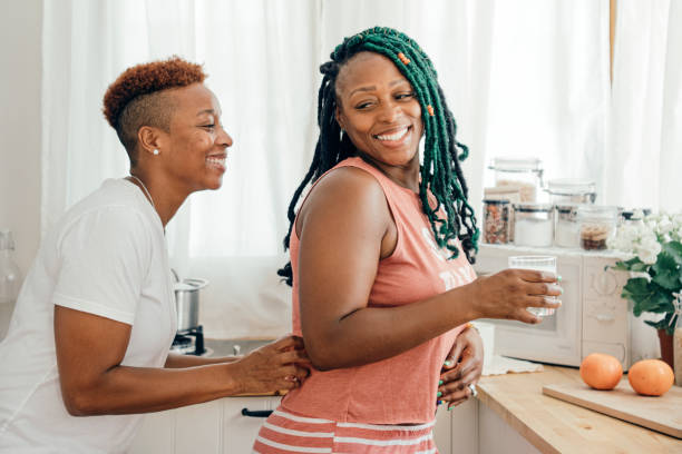 istock Happy gay couple in the kitchen 2158070898
