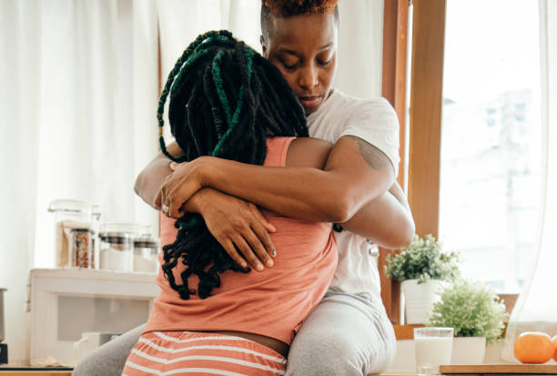 istock Happy gay couple hugging in the kitchen 2158070942