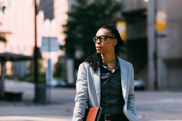 istock Confident Business Professional Walking in Urban Setting 2158071880