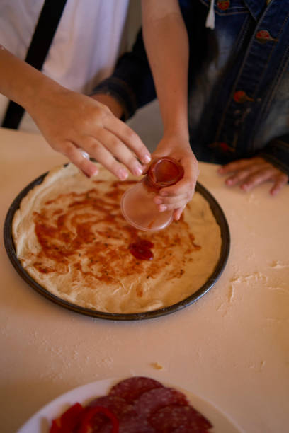 workshop for children on cooking pizza in an old wood-fired oven