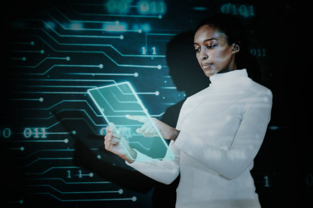 istock African American woman using transparent tablet futuristic technology 2158075012