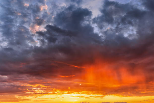 istock A vibrant sunset or sunrise sky with cloudscape in soft magenta 2158076387