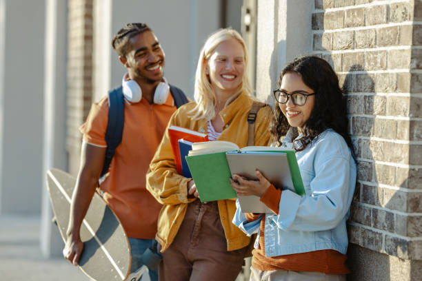 istock Multi-ethnic group of University students hanging out 2158076442