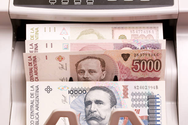 istock Argentine australes in the counting machine 2158076539