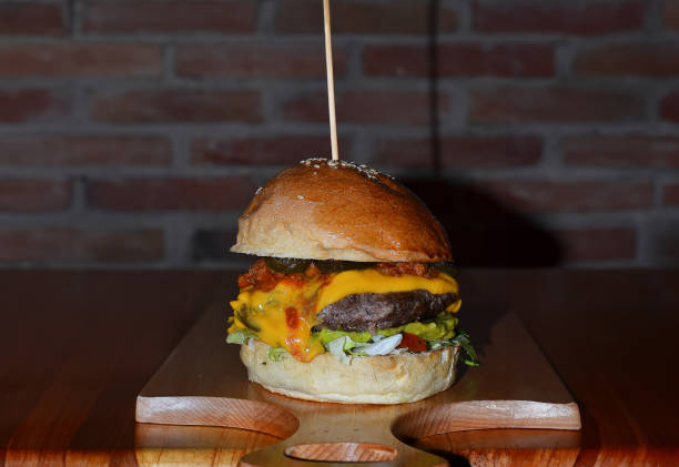 istock some gourmet hamburgers on a restaurant table 2158077783