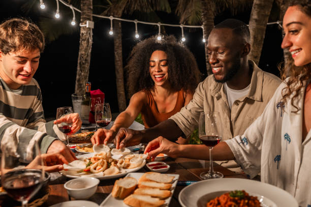 istock Diverse Group Enjoys Outdoor Dinner Celebration 2158080050