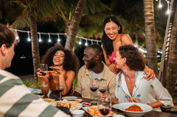istock Diverse Group of Friends at Outdoor Dinner Gathering 2158080057