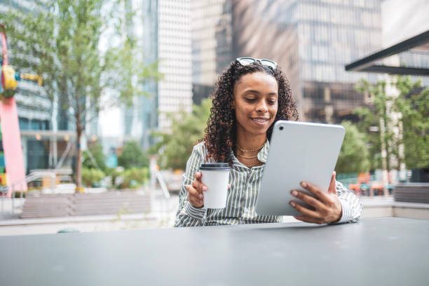 istock African American business woman using digital tablet 2158081784