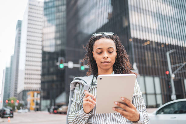 istock African American business woman using digital tablet 2158081811
