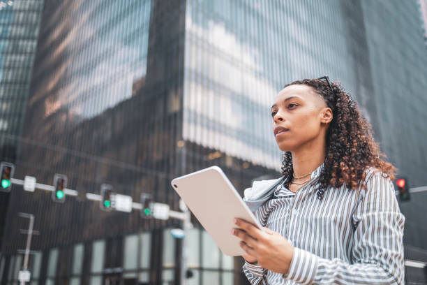 istock African American business woman using digital tablet 2158081834