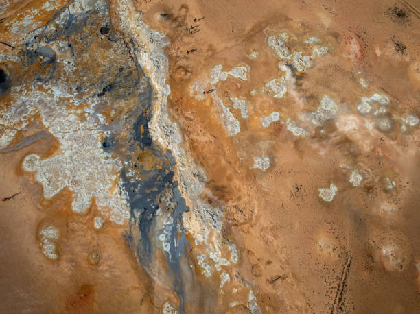 istock Inside a big volcano crater with gray white smoke, aerial view 2158085918