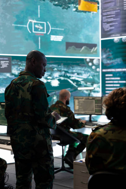 istock Special operations engineer examining surveillance CCTV footage 2158087595