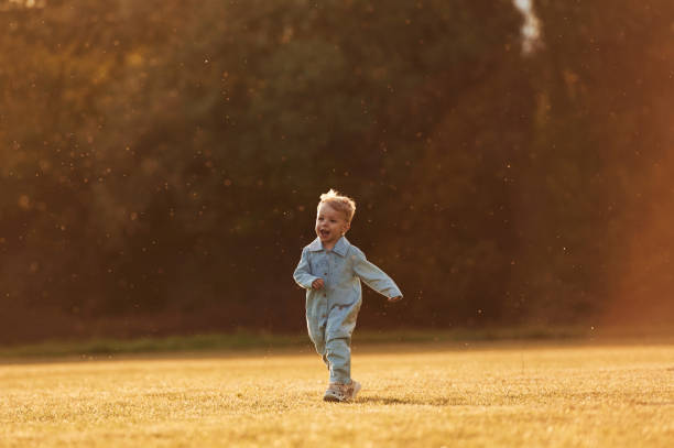 istock Little boy is on the summer field 2158089416