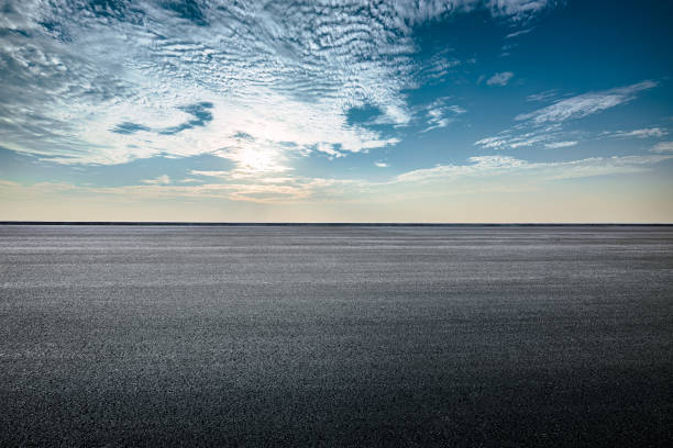 istock Empty asphalt road and cloudscape on sunny day. Car road background 2158089737