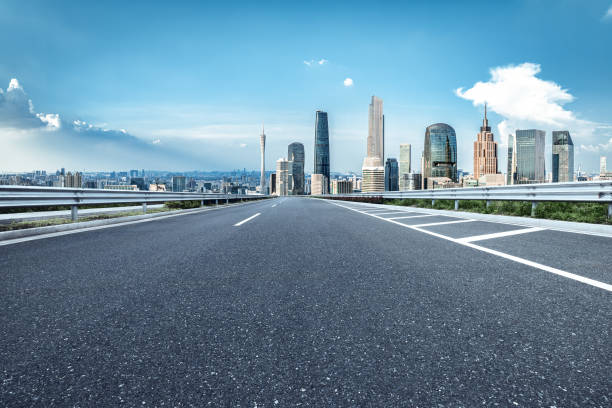istock Empty asphalt road and cityscape in modern city 2158090062
