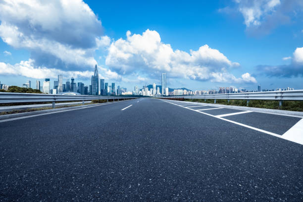 istock Empty asphalt road and cityscape in modern city 2158090074