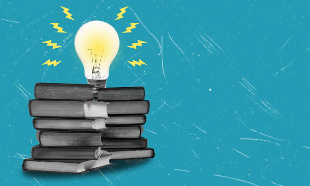 istock A light bulb and an open book a metaphors for a new idea. 2158092347