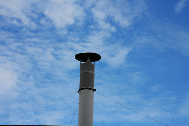 istock A air vent with a blue cloudy sky behind it 2158093065